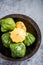 Baby pattypan in rustic bowl