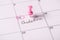 Baby planning concept. Close up view photo of calendar with marked day on calendar and hand written text ovulation