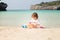 Baby playing on the beach, Menorca Cala Turqueta