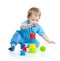 Baby playing with colourful toys on floor