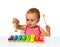 Baby playing xylophone