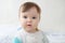 Baby portrait, happy infant nine month kid face