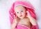 Baby portrait in towel.