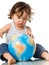 Baby with puzzle globe.