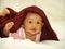 Baby in Red Veil