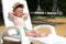 Baby resting on a sun lounger