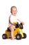 Baby rides a motorbike