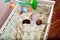 Baby`s restful sleep. Newborn baby in a wooden crib. The baby sleeps in the bedside cradle. Safe living together in a bedside cot