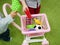 Baby and shopping concept. A child buys toys for himself. Baby boy and trolley