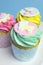 Baby shower or childrens pink, aqua & yellow cupcakes - close up pram