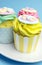 Baby shower or childrens pink, aqua & yellow cupcakes - close up yellow