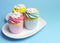 Baby shower or childrens pink, aqua & yellow cupcakes - with copyspace