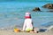 Baby sits on the beach  plays with toys