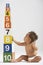 Baby Sitting by Tower of Number Blocks