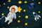 Baby sleep of an astronaut in space with stars