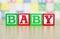 Baby Spelled Out in Alphabet Building Blocks