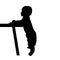 Baby standing at table from profile_silhoutte