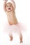 Baby standing in tutu