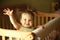 Baby standing up in crib