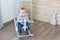 Baby swinging on a rocking chair