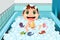 Baby taking bubble bath