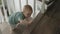 baby toddler boy climbing crawling upstairs home indoors learning climb stairs