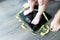 Baby or toddler feet on digital weight scale, mother monitor childâ€™s diet concept