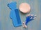 Baby Toiletry Items, tools used for babies on blue wooden background