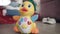 Baby toy duck moving on floor. Musical toy with button and lights moving
