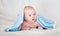 Baby, Two Month Old. two-month-old baby is covered with a blue veil