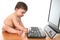 Baby typing on a computer keyboard