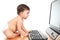 Baby typing on a computer keyboard