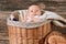 Baby in a willow basket.