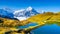 Bachalpsee, Grindelwald, Switzerland. Hiking and traveling in the mountains. Swiss classic landscape.