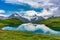 Bachalpsee lake at dawn, Bernese Oberland, Switzerland. Alpine view of the Mt. Schreckhorn and Wetterhorn. Location Bachalpsee in