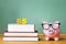 Bachelor of Science degree theme with textbooks and piggy bank