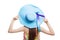 Back of girl holding a hat over white