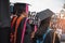 Back of graduation with black blue tail cap at ceremony in graduation in the University.