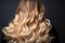 Back hairs nature tribute Isolated blond balayage signifies youth, care, and beauty