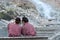 Back of Japanese women who have relaxing time with foot spa in hot spring at natural onsen park town kusatsu gunma Japan