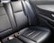 Back passenger black leather seats in modern luxury car. Black perforated leather with stitching. Car inside. Leather comfortable