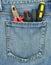 Back pocket of jeans with tools
