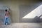 Back portrait of workers plastering the cement texture