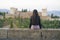 Back portrait of young beautiful and relaxed woman having Summer holidays in Spain enjoying cheerful beautiful view at Alhambra of