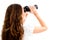 Back pose of female holding binocular