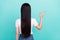 Back rear view photo of young asian girl incognito haircare hairdo show okay alright cool sign isolated over turquoise