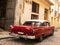 Back Red old and classical car in road of old Havana Cuba