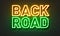 Back road neon sign on brick wall background.