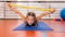 Back strengthening exercise for children with a bar