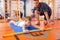 Back strengthening exercise for children with a bar